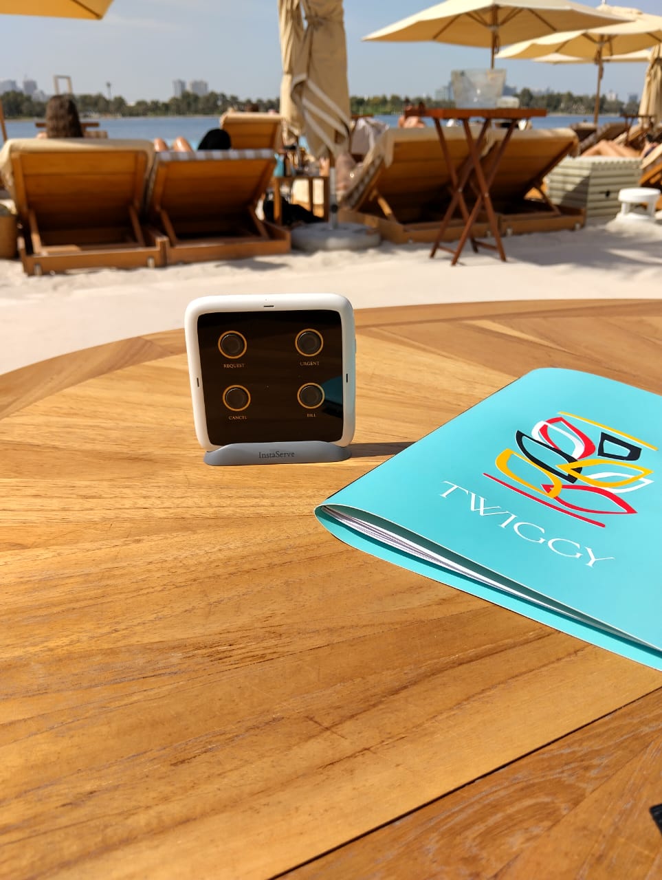 InstaServe table console on a sunny hospitality terrace