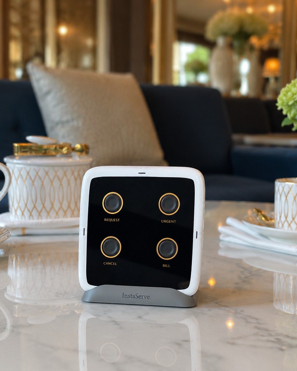 InstaServe discreet table console in a premium hospitality setting